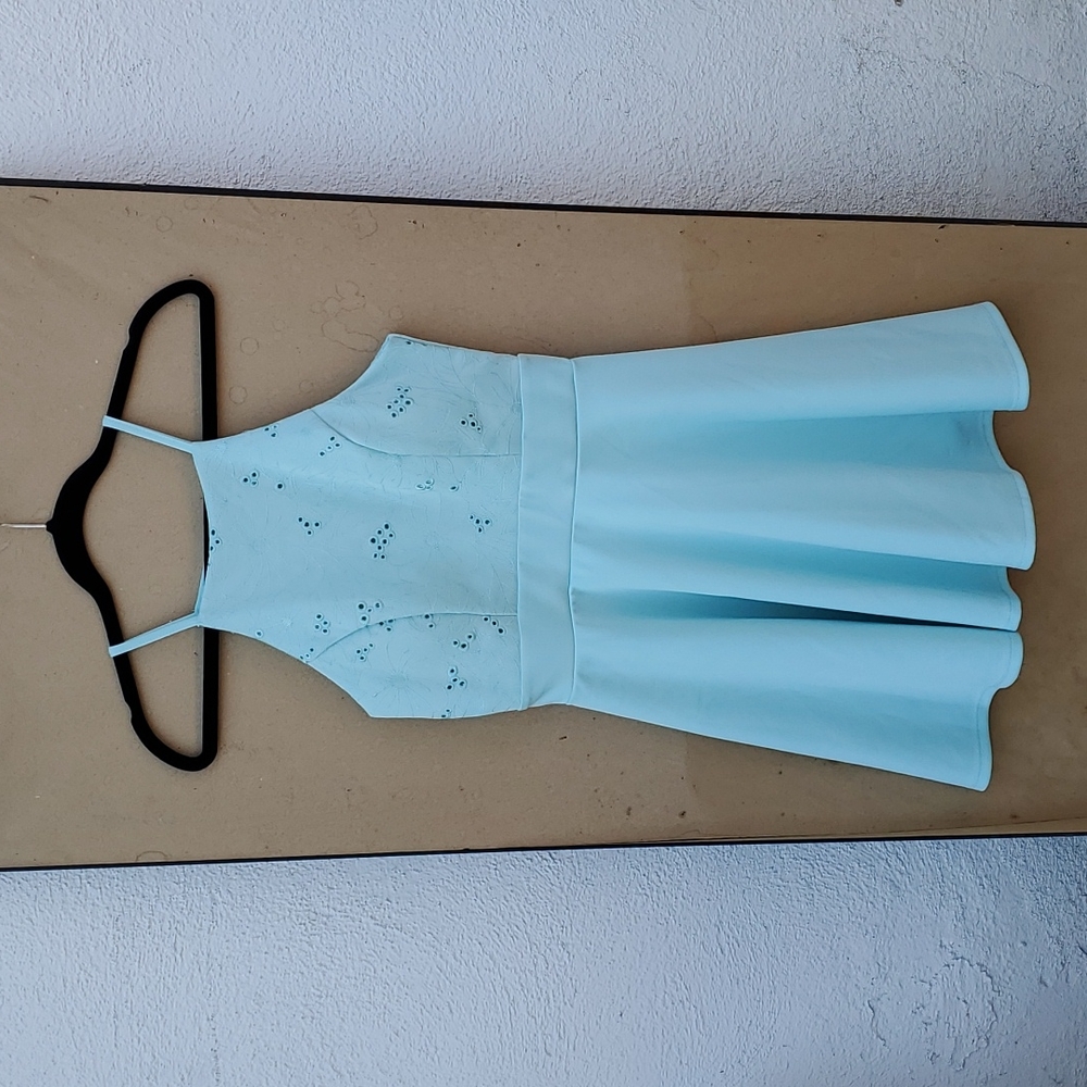 I am selling a used small light blue dress.